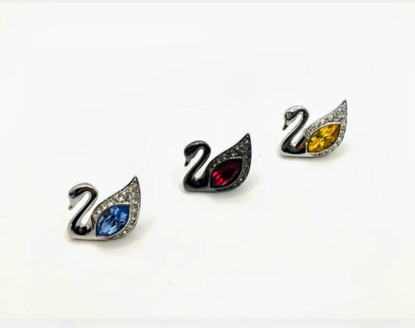 Swarovski swan crystal pin set with blue red and yellow stones